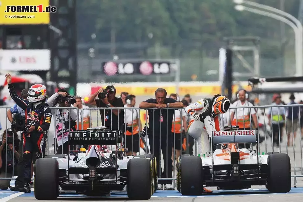 Foto zur News: Sebastian Vettel (Red Bull) und Nico Hülkenberg (Force India)