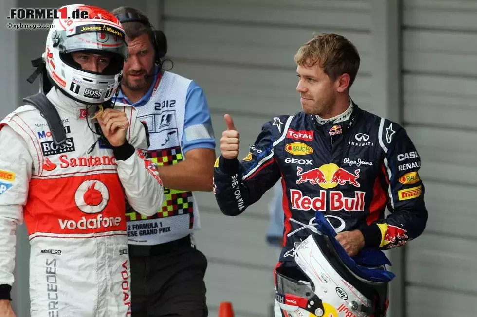 Foto zur News: Jenson Button (McLaren) und Sebastian Vettel (Red Bull)