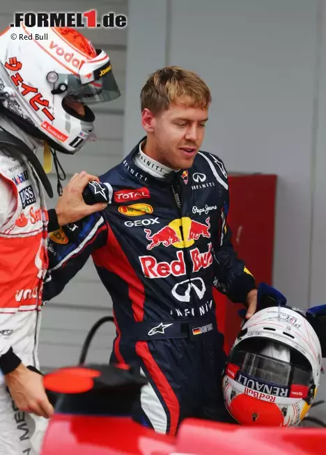 Foto zur News: Sebastian Vettel (Red Bull) und Jenson Button (McLaren)