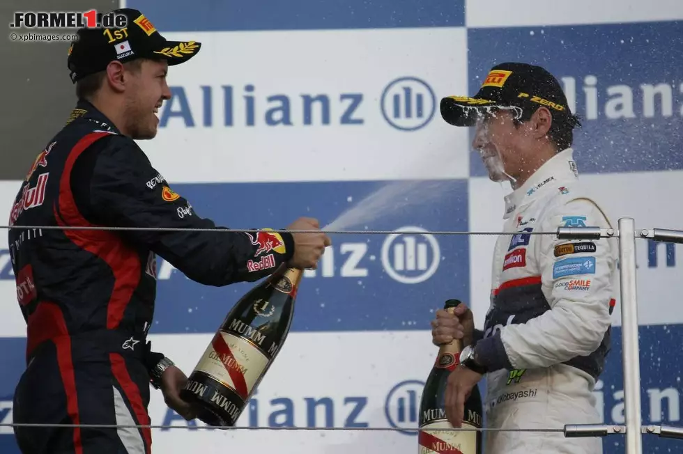 Foto zur News: Sebastian Vettel (Red Bull) und Kamui Kobayashi (Sauber)