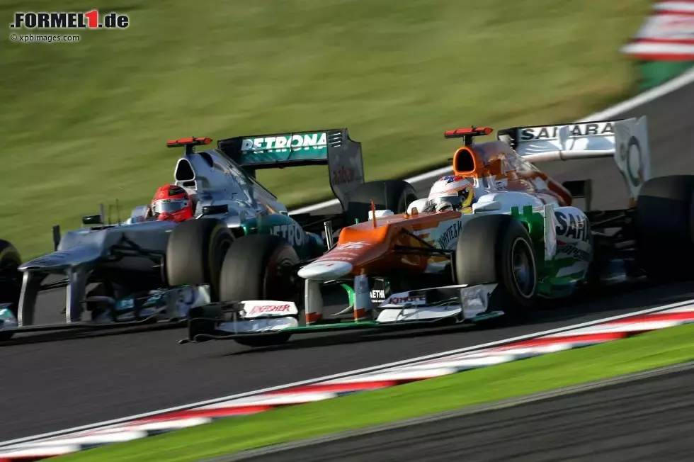 Foto zur News: Michael Schumacher (Mercedes) und Paul di Resta (Force India)