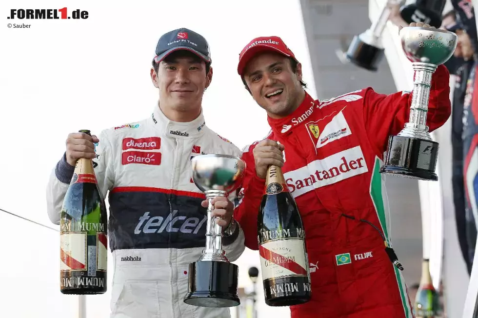 Foto zur News: Kamui Kobayashi (Sauber) und und Felipe Massa (Ferrari)