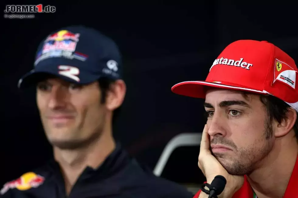 Foto zur News: Mark Webber (Red Bull) und Fernando Alonso (Ferrari)