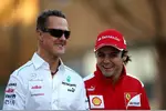 Foto zur News: Michael Schumacher (Mercedes) und Felipe Massa (Ferrari)