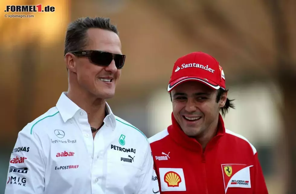 Foto zur News: Michael Schumacher (Mercedes) und Felipe Massa (Ferrari)