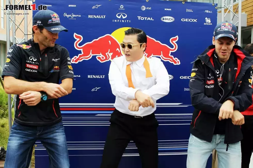 Foto zur News: Mark Webber und Sebastian Vettel mit Rapper Psy beim Gangnam Style