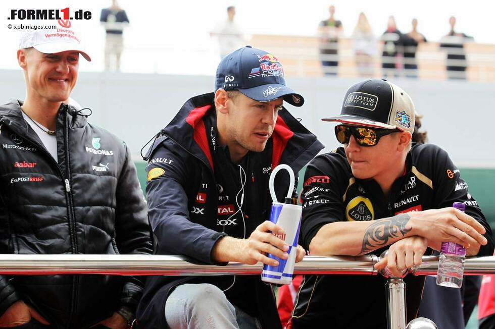 Foto zur News: Michael Schumacher (Mercedes), Sebastian Vettel (Red Bull) und Kimi Räikkönen (Lotus)