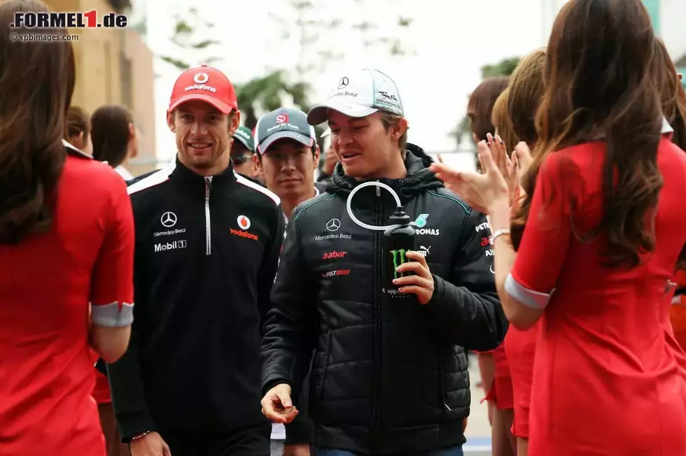 Foto zur News: Jenson Button (McLaren) und Nico Rosberg (Mercedes)