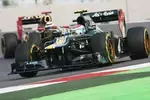 Foto zur News: Witali Petrow (Caterham) und Kimi Räikkönen (Lotus)