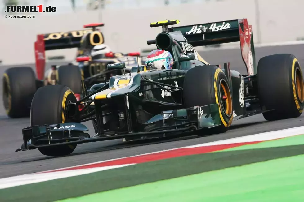 Foto zur News: Witali Petrow (Caterham) und Kimi Räikkönen (Lotus)