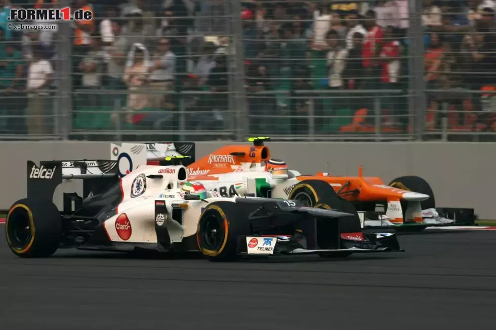 Foto zur News: Sergio Perez (Sauber) und Nico Hülkenberg (Force India)