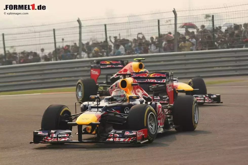 Foto zur News: Sebastian Vettel (Red Bull) und Mark Webber (Red Bull)