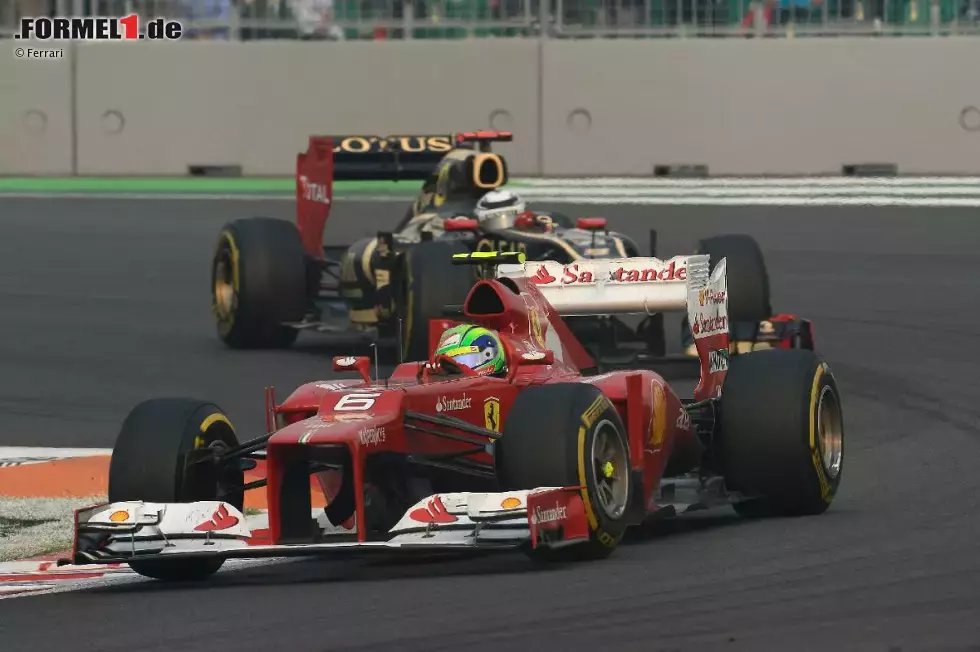 Foto zur News: Felipe Massa (Ferrari) vor Kimi Räikkönen (Lotus)