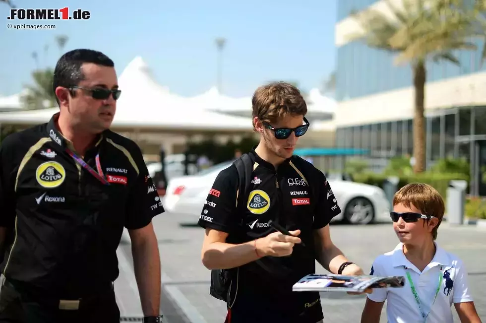 Foto zur News: Romain Grosjean (Lotus) und Eric Boullier (Lotus-Teamchef)