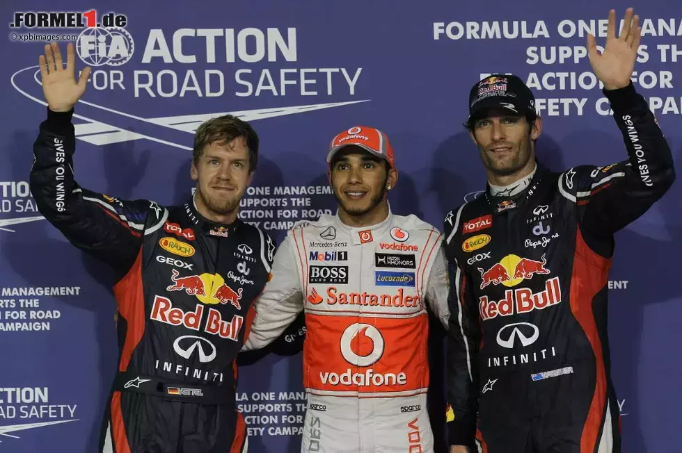 Foto zur News: Nach dem Qualifying: Sebastian Vettel (Red Bull), Lewis Hamilton (McLaren) und Mark Webber (Red Bull)