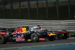 Foto zur News: Sebastian Vettel (Red Bull) und Jenson Button (McLaren)