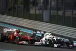 Foto zur News: Felipe Massa (Ferrari) und Sergio Perez (Sauber)