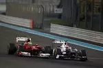 Foto zur News: Felipe Massa (Ferrari) und Sergio Perez (Sauber)