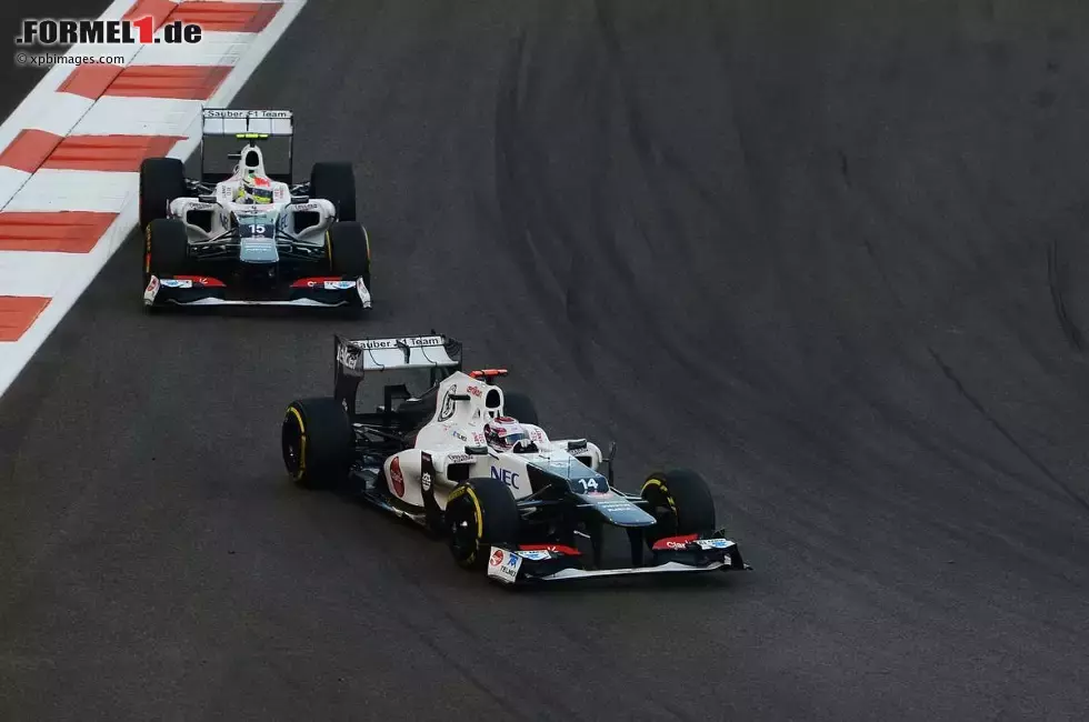 Foto zur News: Kamui Kobayashi (Sauber) und Sergio Perez (Sauber)