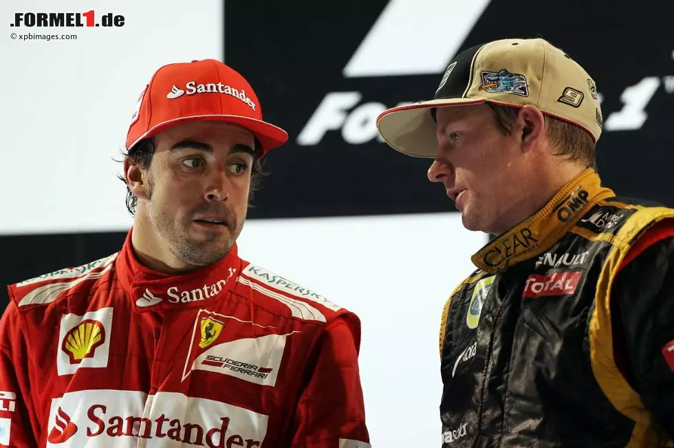 Foto zur News: Fernando Alonso (Ferrari) und Kimi Räikkönen (Lotus)