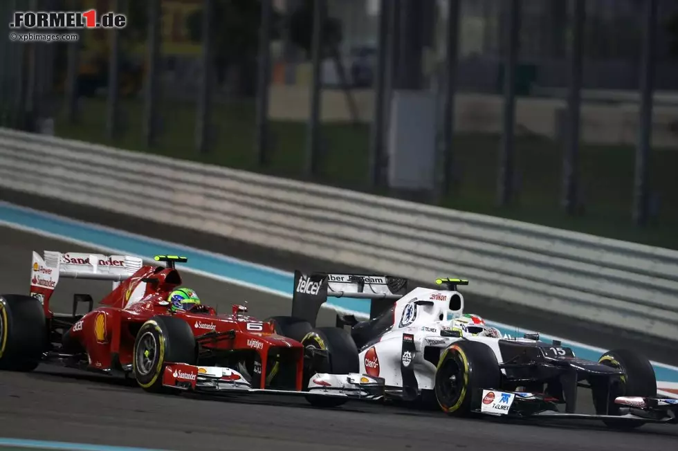 Foto zur News: Felipe Massa (Ferrari) und Sergio Perez (Sauber)