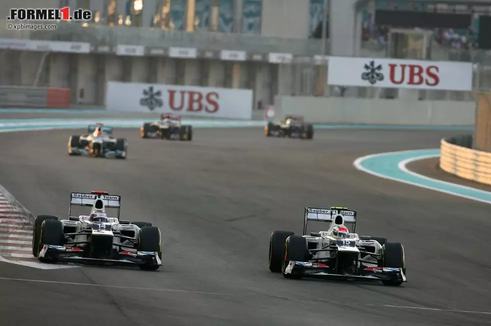 Foto zur News: Kamui Kobayashi (Sauber) und Sergio Perez (Sauber)