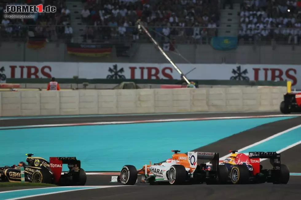 Foto zur News: Paul di Resta (Force India) und Sebastian Vettel (Red Bull)