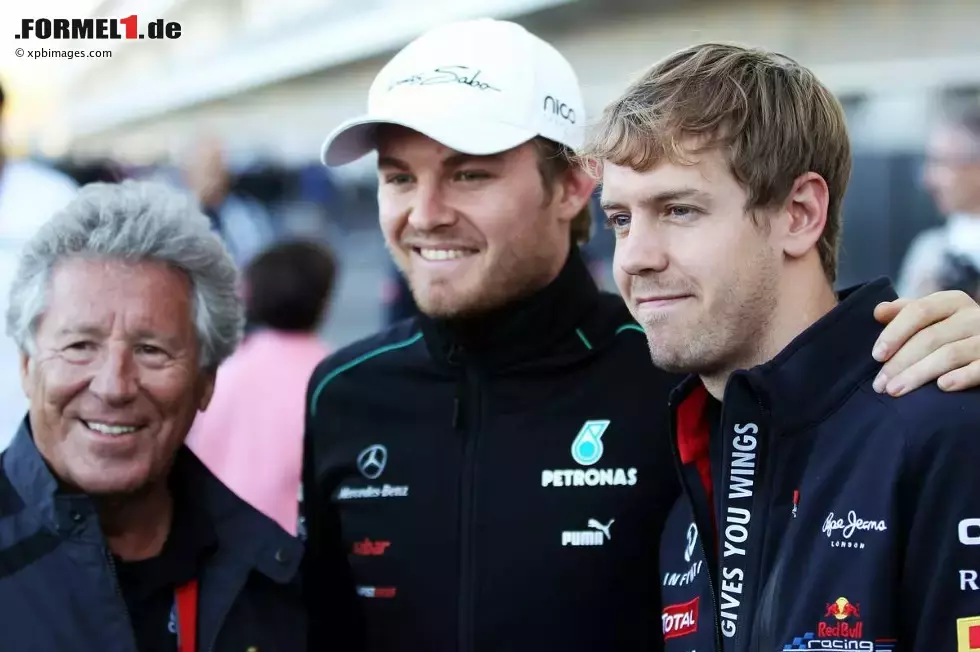 Foto zur News: Nico Rosberg (Mercedes) und Sebastian Vettel (Red Bull)