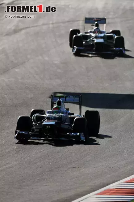 Foto zur News: Sergio Perez (Sauber) und Kamui Kobayashi (Sauber)