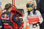 Foto zur News: Sebastian Vettel (Red Bull) und Lewis Hamilton (McLaren)