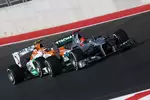 Foto zur News: Michael Schumacher (Mercedes) und Nico Hülkenberg (Force India)