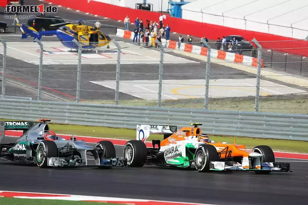 Foto zur News: Nico Hülkenberg (Force India) und Michael Schumacher (Mercedes)