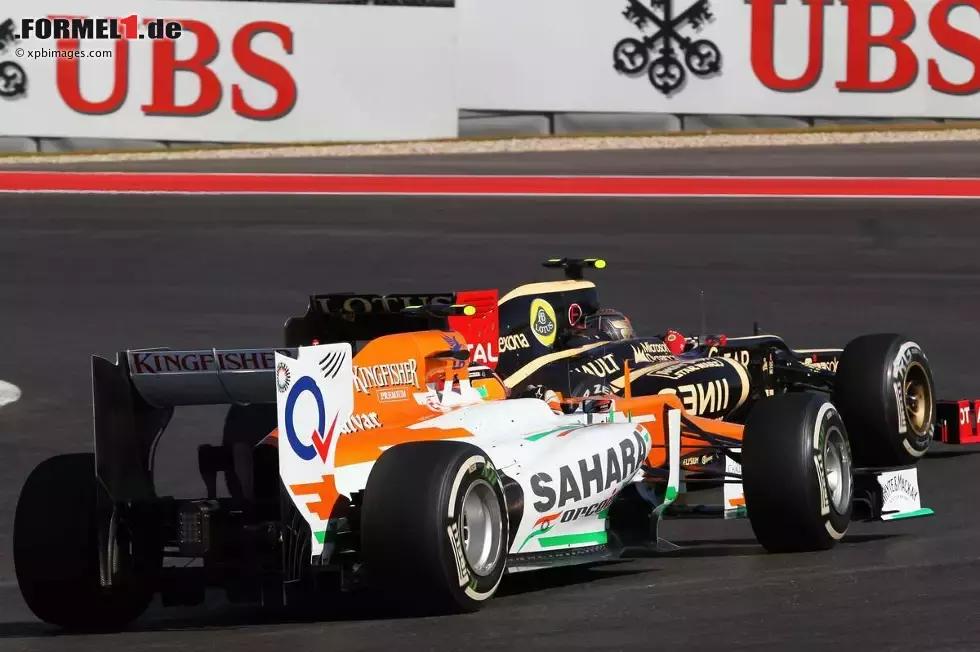 Foto zur News: Romain Grosjean (Lotus) und Nico Hülkenberg (Force India)