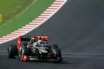 Foto zur News: Lewis Hamilton (McLaren) und Kimi Räikkönen (Lotus)