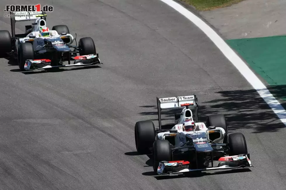 Foto zur News: Kamui Kobayashi (Sauber) und Sergio Perez (Sauber)