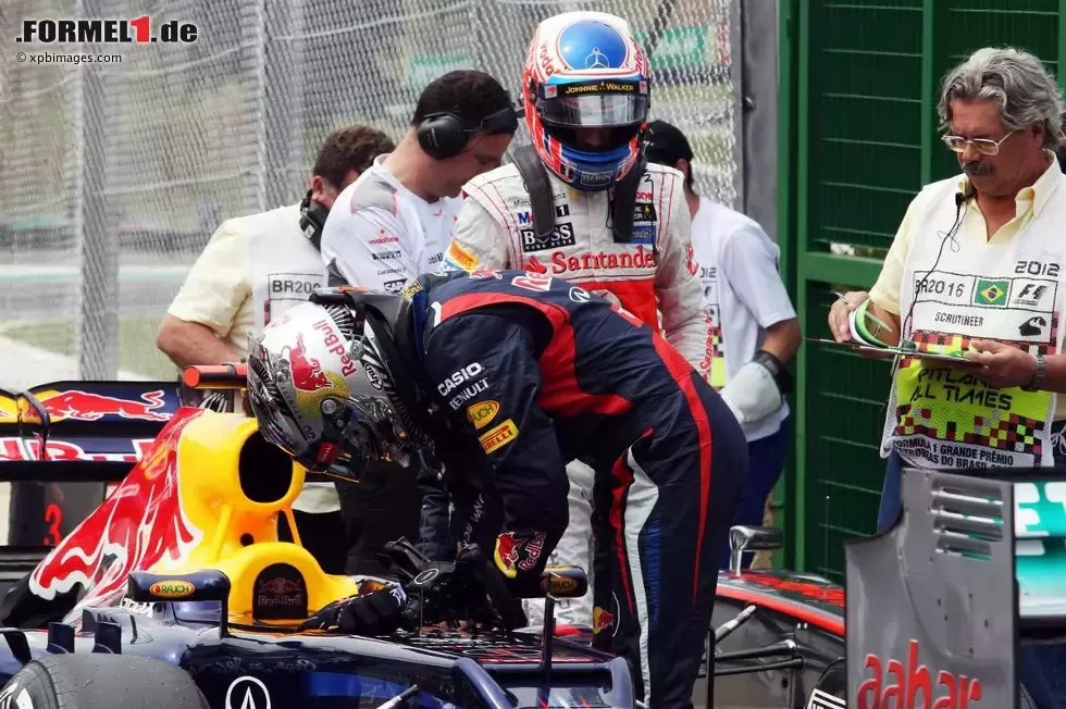 Foto zur News: Sebastian Vettel (Red Bull) und Jenson Button (McLaren)