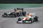 Foto zur News: Paul di Resta (Force India) und Heikki Kovalainen (Caterham)