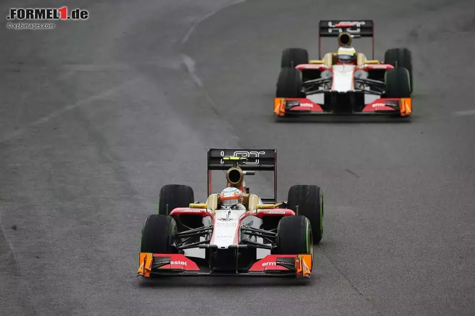 Foto zur News: Das letzte Rennen von HRT? Narain Karthikeyan (HRT) und Pedro de la Rosa (HRT) in Sao Paulo