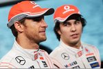 Foto zur News: Jenson Button (McLaren) und Sergio Perez (McLaren)