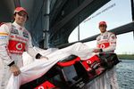 Foto zur News: Sergio Perez (McLaren) und Jenson Button (McLaren)