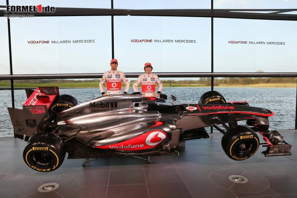 Foto zur News: Jenson Button (McLaren) und Sergio Perez (McLaren)