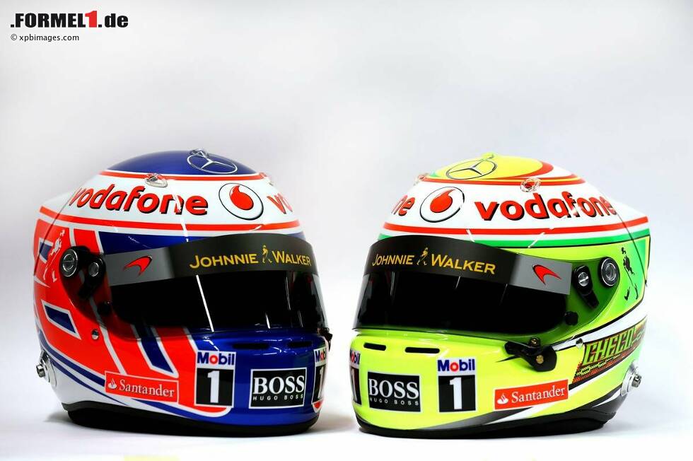 Foto zur News: Helme von Jenson Button (McLaren) und Sergio Perez (McLaren)