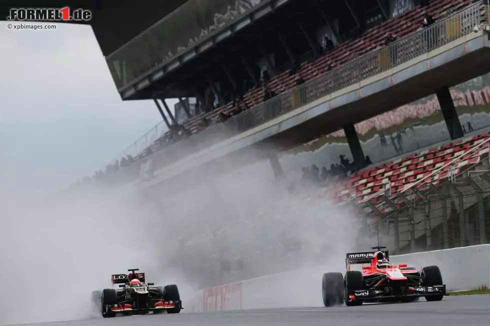 Foto zur News: Romain Grosjean (Lotus) und Max Chilton (Marussia)