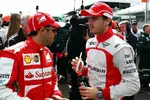 Foto zur News: Felipe Massa (Ferrari) und Jules Bianchi (Marussia)