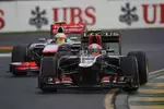 Foto zur News: Romain Grosjean (Lotus) und Sergio Perez (McLaren)