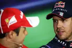 Foto zur News: Felipe Massa (Ferrari) und Sebastian Vettel (Red Bull)