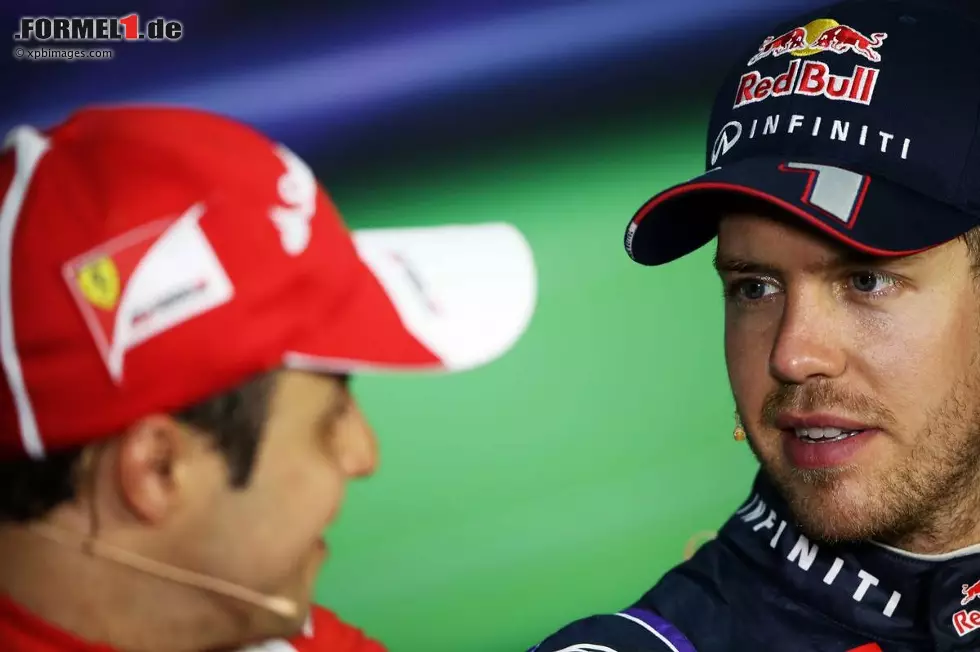 Foto zur News: Felipe Massa (Ferrari) und Sebastian Vettel (Red Bull)