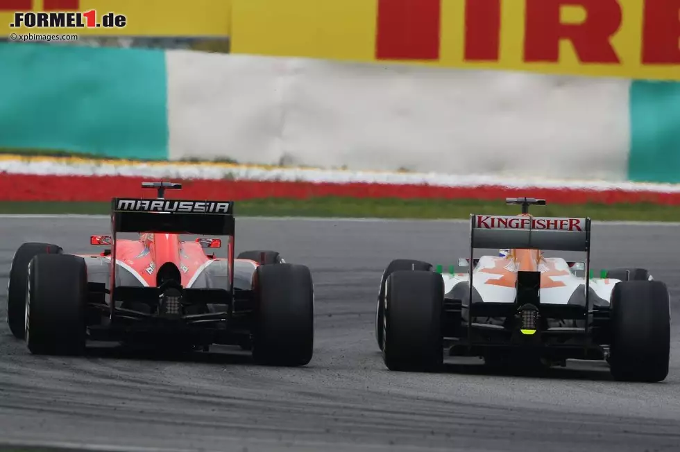 Foto zur News: Paul di Resta (Force India) und Jules Bianchi (Marussia)