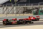 Foto zur News: Fernando Alonso (Ferrari) und Romain Grosjean (Lotus)