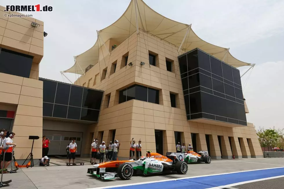 Foto zur News: Adrian Sutil (Force India) und Paul di Resta (Force India)